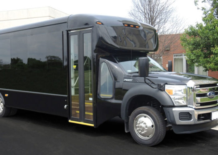 Front Exterior View of Black 32 Passenger Bus