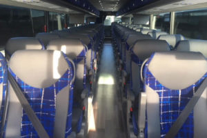 Aisle view of Interior Seating of 56 Passenger Motor Coach